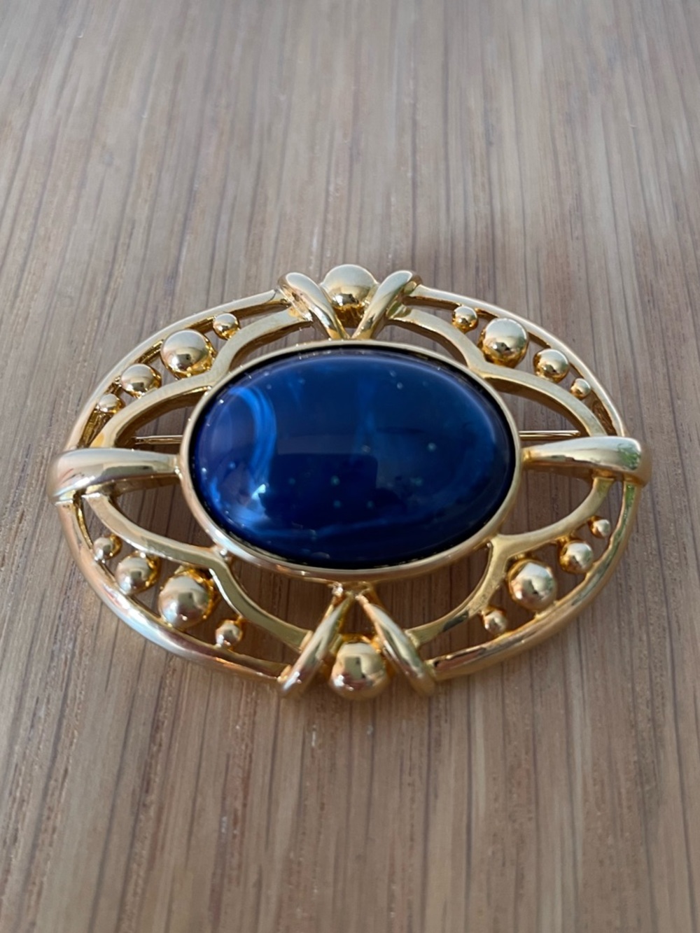 Vintage Gold-Tone Brooch with Deep Blue Galaxy Cabochon
